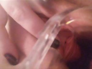 Peeing close to own pussy alongside speculum