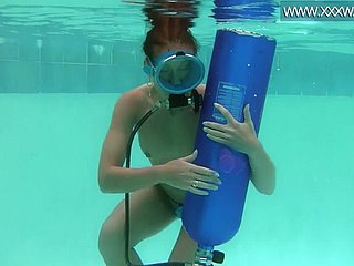 Hungarian belle fucks a dildo submersed